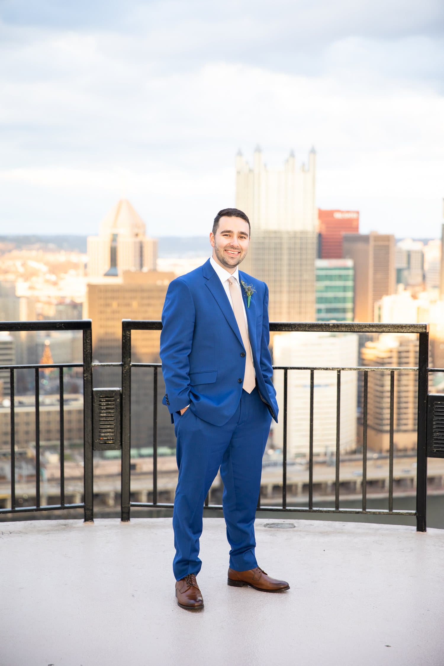 Dominick Caruso, with the downtown Pittsburgh skyline behind him